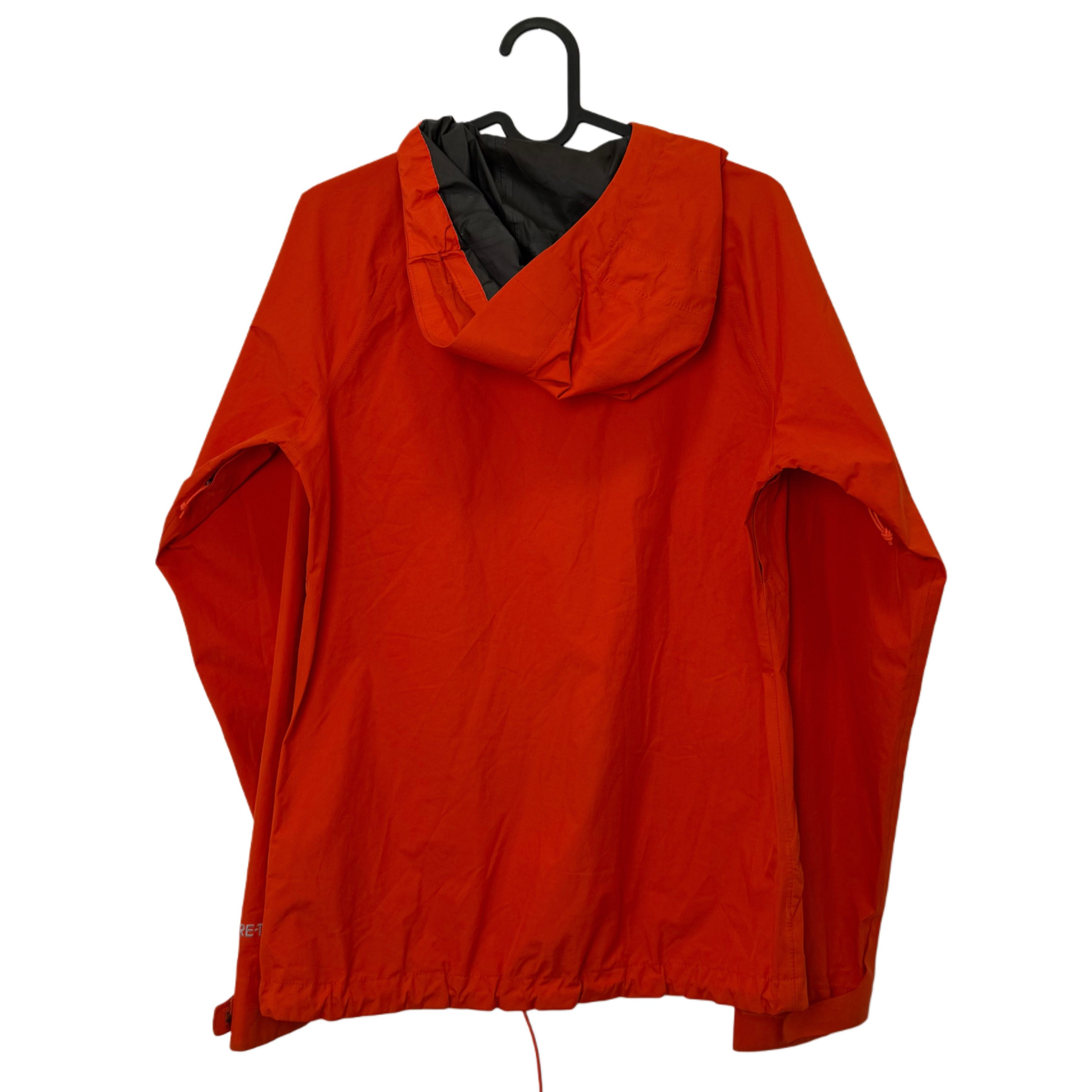THE NORTH FACE ORANGE JACKET